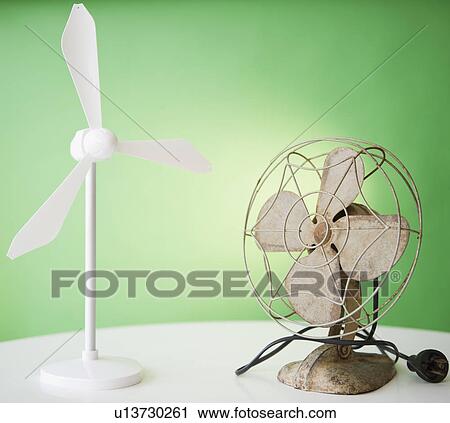 Close up of model of wind turbine and vintage electric fan View Large Photo Image Stock Image - Close up of model of wind turbine and vintage electric fan. Fotosearch