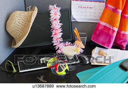 Close up of office desk with vacation equipment View Large Photo Image Stock Photo - Close up of office desk with vacation equipment. Fotosearch