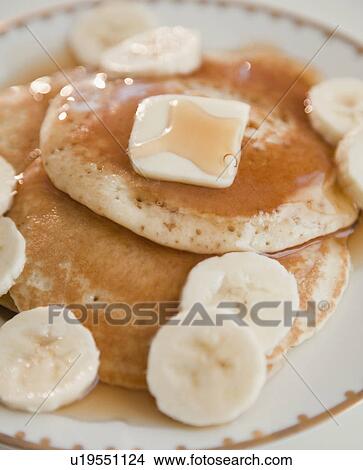 Close up of pancakes with bananas View Large Photo Image Picture - Close up of pancakes with bananas. Fotosearch