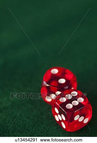 Close up of red dices on green felt View Large Photo Image Stock Image - Close up of red dices on green felt. Fotosearch