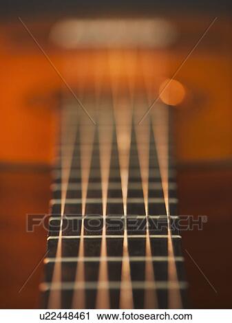 Close up of strings of acoustic guitar View Large Photo Image Stock Image - Close up of strings of acoustic guitar. Fotosearch