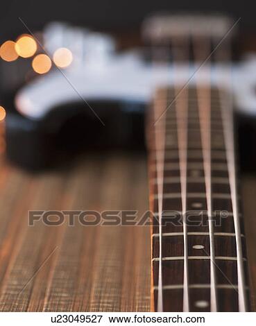 Stock Photo - Close up of strings of bass guitar. Fotosearch