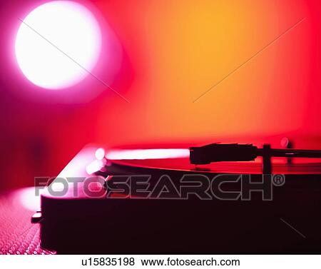 Close up of turntable on colored background View Large Photo Image Stock Photo - Close up of turntable on colored background. Fotosearch