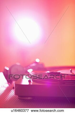 Close up of turntable on colored background View Large Photo Image Stock Photo - Close up of turntable on colored background. Fotosearch