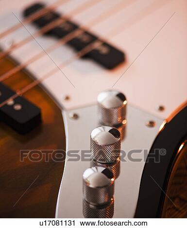 Close up of volume knobs of bass guitar View Large Photo Image Stock Image - Close up of volume knobs of bass guitar. Fotosearch