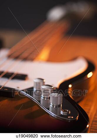 Close up of volume knobs of bass guitar View Large Photo Image Stock Image - Close up of volume knobs of bass guitar. Fotosearch