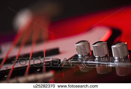 Close up of volume knobs of bass guitar View Large Photo Image Stock Image - Close up of volume knobs of bass guitar. Fotosearch
