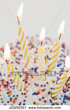 Cupcake with birthday candles View Large Photo Image Stock Image - Cupcake with birthday candles. Fotosearch