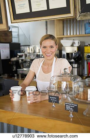 Female cafe owner View Large Photo Image Stock Image - Female cafe owner. Fotosearch