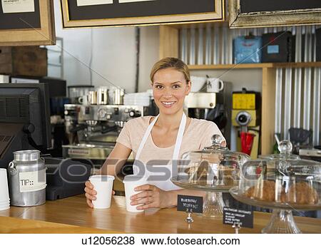 Stock Photo - Female cafe owner. Fotosearch