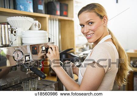 Stock Photograph - Female cafe owner. Fotosearch