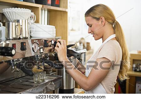 Stock Photograph - Female cafe owner. Fotosearch