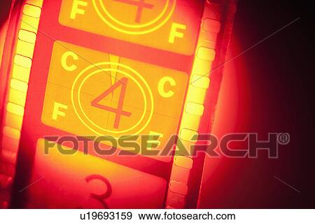 Film reel in spotlight View Large Photo Image Stock Photo - Film reel in spotlight. Fotosearch