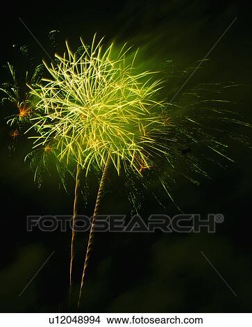 Picture - Fireworks explosion against night sky. Fotosearch