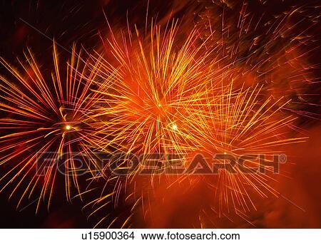 Picture - Fireworks explosion against night sky. Fotosearch