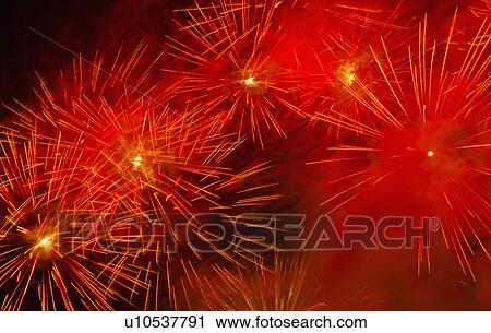 Stock Image - Fireworks explosion against night sky. Fotosearch