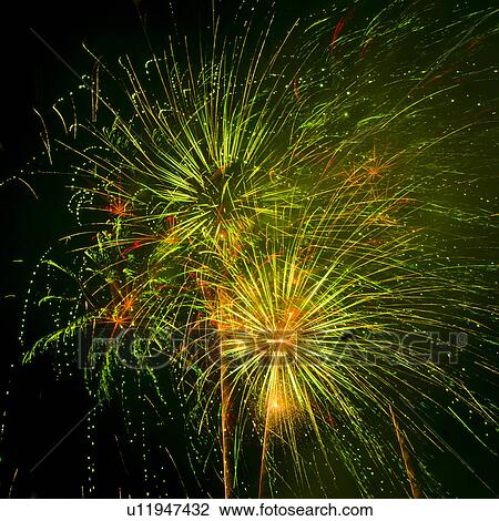 Fireworks explosion against night sky View Large Photo Image Stock Image - Fireworks explosion against night sky. Fotosearch