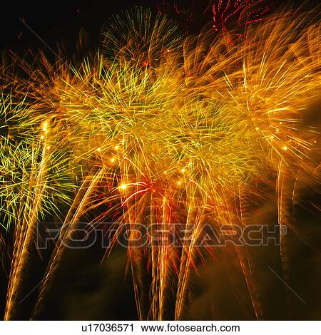 Stock Image - Fireworks explosion against night sky. Fotosearch