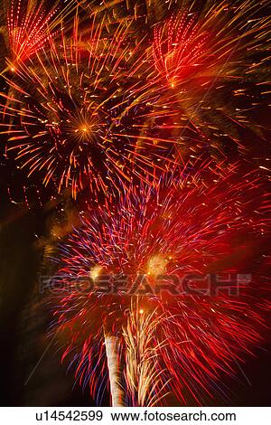 Fireworks explosion against night sky View Large Photo Image Stock Photo - Fireworks explosion against night sky. Fotosearch