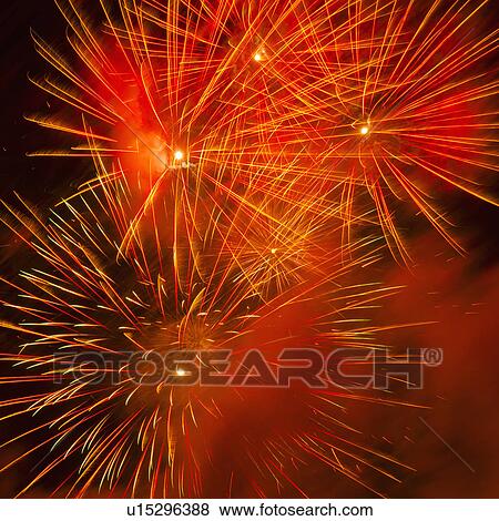 Stock Photo - Fireworks explosion against night sky. Fotosearch