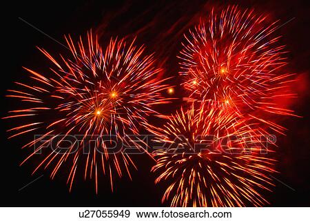 Fireworks explosion against night sky View Large Photo Image Stock Photo - Fireworks explosion against night sky. Fotosearch