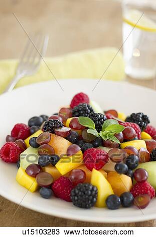 Fresh fruit salad in bowl on table View Large Photo Image Stock Image - Fresh fruit salad in bowl on table. Fotosearch