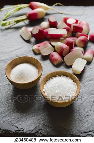 Stock Photo - Fresh radishes with salt. Fotosearch