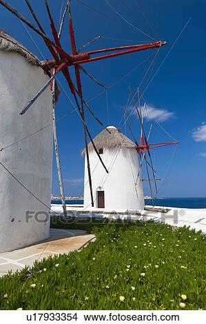 Picture - Greece, Cyclades Islands, Mykonos, Old windmills at coast. Fotosearch