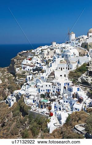 Stock Image - Greece, Cyclades Islands, Santorini, Oia, Town at coast. Fotosearch