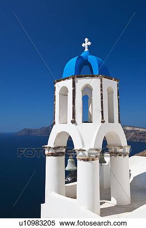 Stock Photography - Greece, Cyclades Islands, Santorini, Oia, Church bell tower at coast. Fotosearch