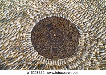 Greece, Rhodes, Manhole cover with symbol of Rhodes View Large Photo Image Stock Image - Greece, Rhodes, Manhole cover with symbol of Rhodes. Fotosearch