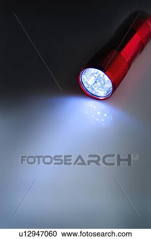 Illuminated flashlight View Large Photo Image Stock Image - Illuminated flashlight. Fotosearch