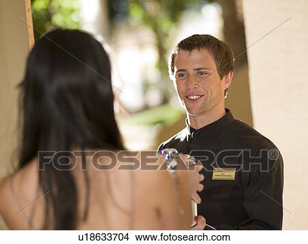 Man from room service delivering  View Large Photo Image Picture - Man from room service delivering . Fotosearch
