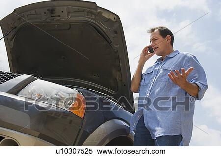 Man having car problems View Large Photo Image Stock Photography - Man having car problems. Fotosearch