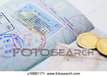 Stock Image - Passport with Turkish lira. Fotosearch