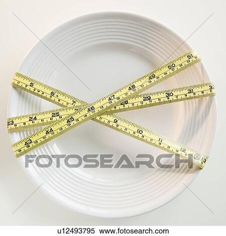 Plate tied with tape measure View Large Photo Image Stock Photography - Plate tied with tape measure. Fotosearch
