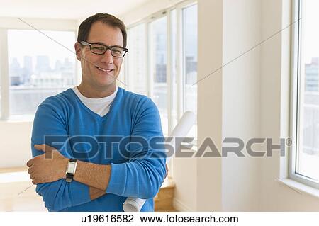 Stock Image - Portrait of architect in office. Fotosearch