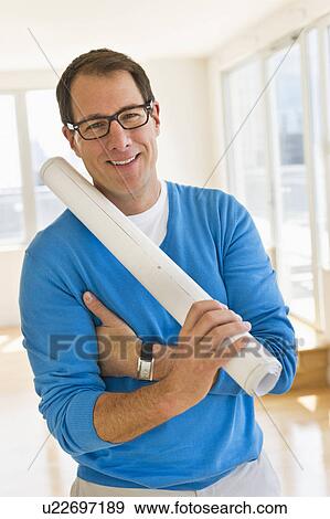 Stock Photo - Portrait of architect in office. Fotosearch
