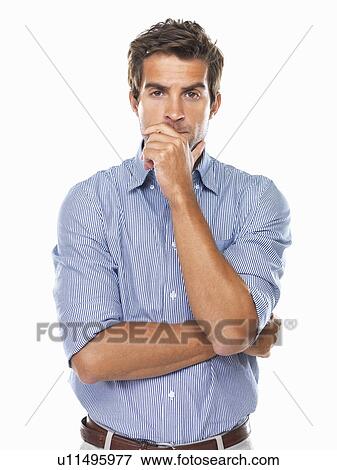 Portrait of business man standing and wondering View Large Photo Image Stock Photo - Portrait of business man standing and wondering. Fotosearch