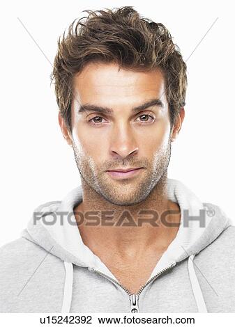 Stock Image - Portrait of confident young man. Fotosearch