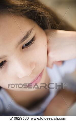 Stock Image - Portrait of girl (10-11). Fotosearch