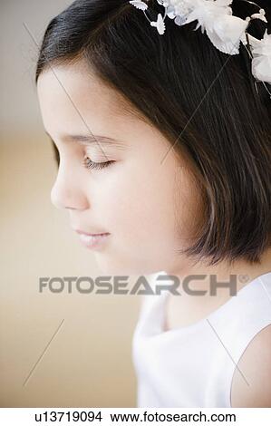Picture - Portrait of girl's (8-9) celebrating Fist Communion. Fotosearch