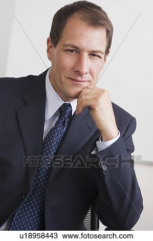 Stock Image - Portrait of mature businessman. Fotosearch