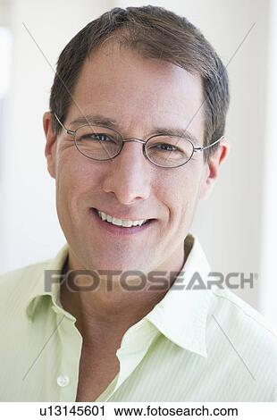 Stock Image - Portrait of mature man. Fotosearch