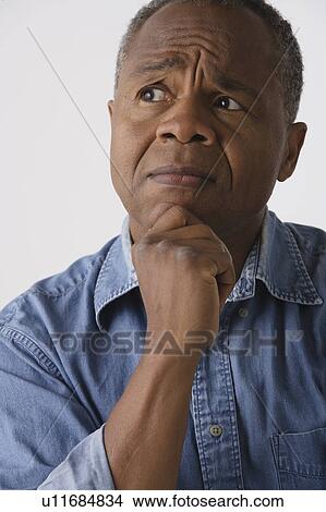Portrait of mature man, studio shot View Large Photo Image Picture - Portrait of mature man, studio shot. Fotosearch