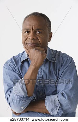 Picture - Portrait of mature man, studio shot. Fotosearch