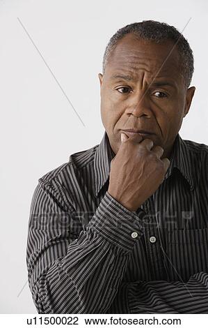 Portrait of mature man, studio shot View Large Photo Image Stock Image - Portrait of mature man, studio shot. Fotosearch