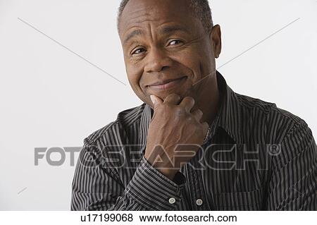 Portrait of mature man, studio shot View Large Photo Image Stock Photo - Portrait of mature man, studio shot. Fotosearch