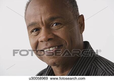 Portrait of mature man, studio shot View Large Photo Image Stock Photo - Portrait of mature man, studio shot. Fotosearch