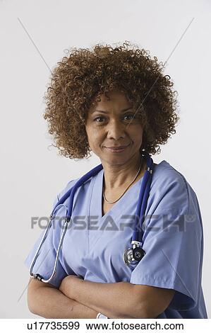 Portrait of nurse, studio shot View Large Photo Image Stock Photo - Portrait of nurse, studio shot. Fotosearch